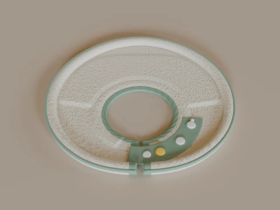 mybetterbib design laid flat, showing the complete ivory absorbent shelf, sage trim, neck opening, and snap closure